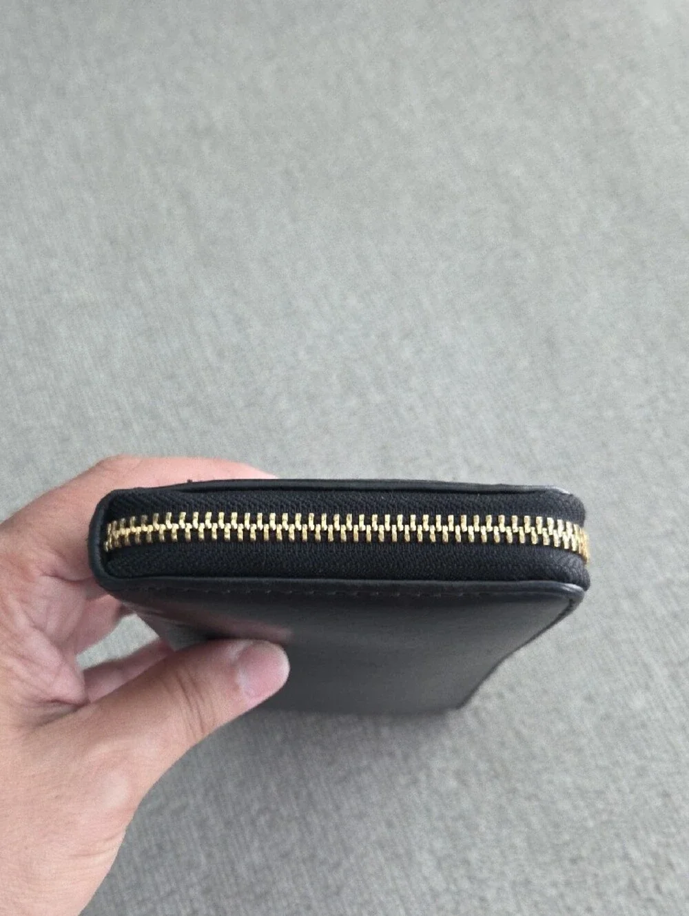 Michael Kors Black Leather Zip-Around Wallet with Gold Plaque